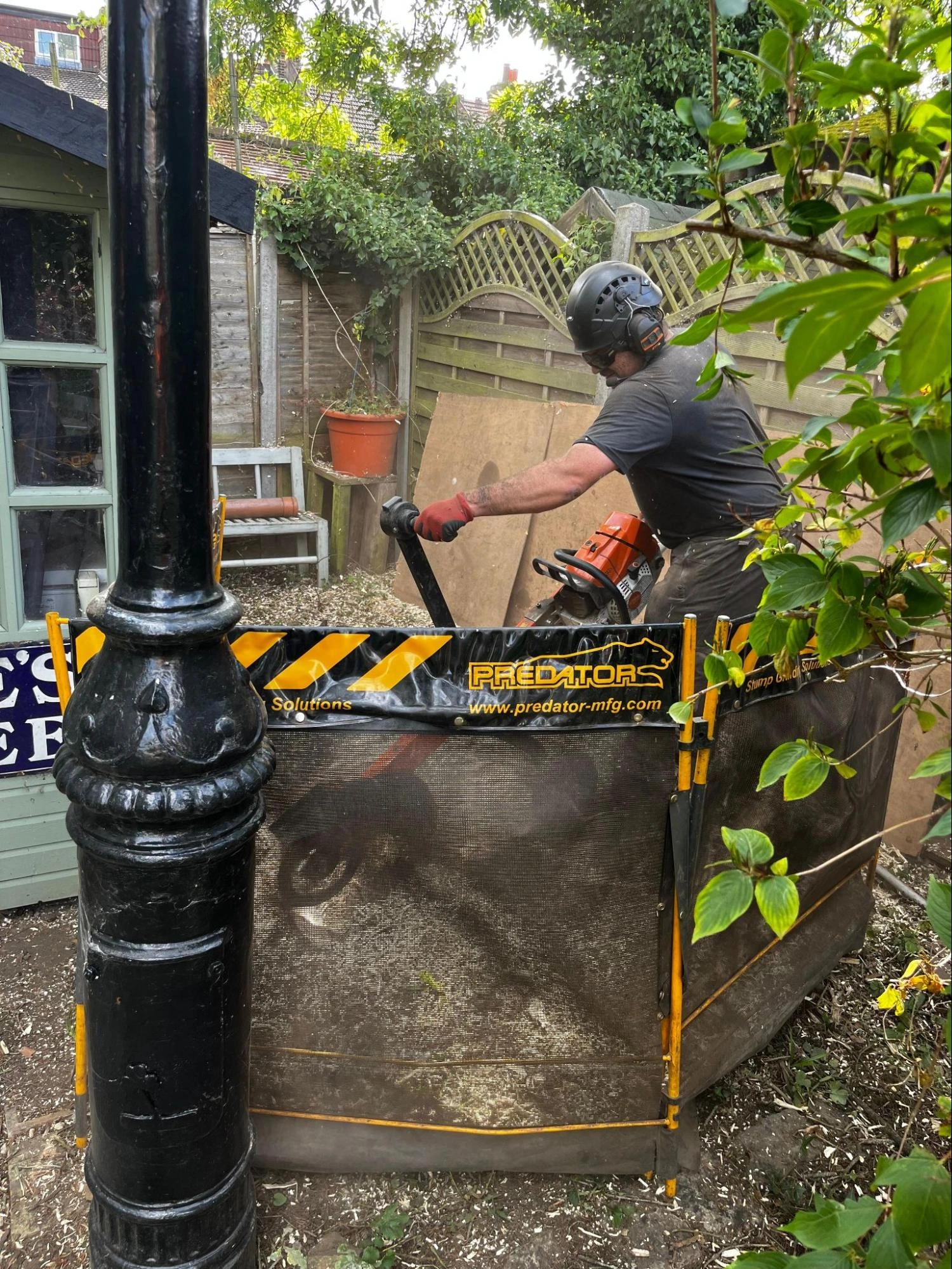 Tree Surgeon Using A Stump Grinder To Remove A Tree Stump Ingatestone